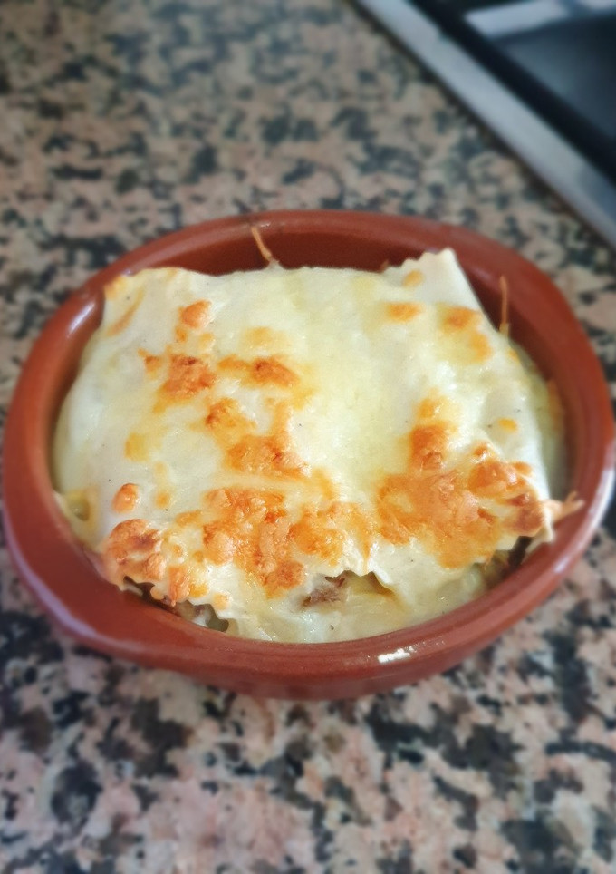 Una foto de Canelones de cocido