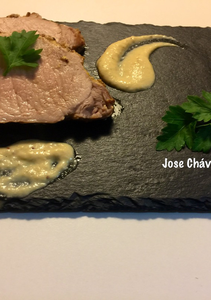 Una foto de Cinta de Lomo de Cerdo con salsa de Mostaza