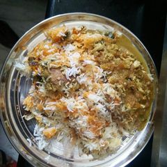 A picture of Hyderabadi Chicken Biryani.