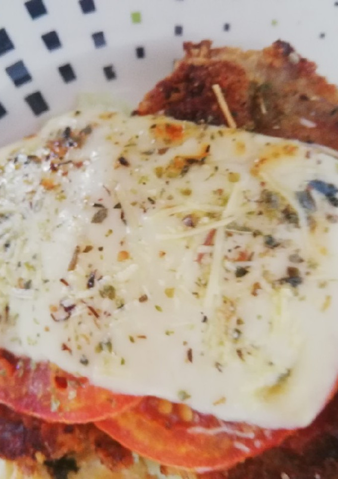 Una foto de Chuleta de cerdo a la napolitana