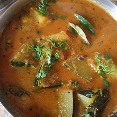 A picture of Red pumpkin curry.