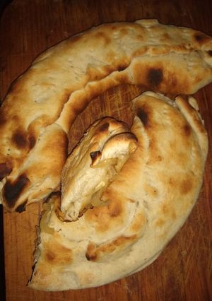 Una foto de Pan relleno de queso cebolla