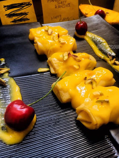 A picture of Mango Malai Khandvi.