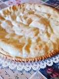 Torta di frolla con crema e pesche