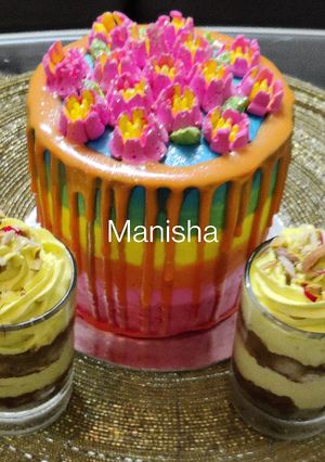 A picture of Holi special Thandai flavour colorful cake.