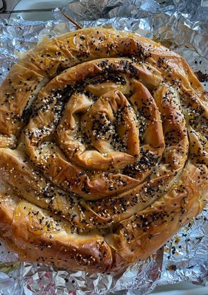 A picture of Cheese pie with honey 🍯.