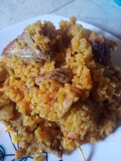 Una foto de Arroz mixto de pollo y cerdo