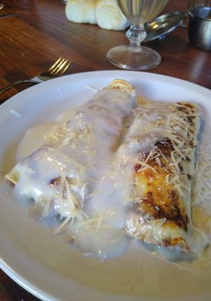 Una foto de Canelones de carne con bechamel