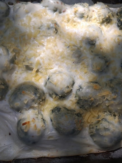 Una foto de Malfatti de ricota y espinaca