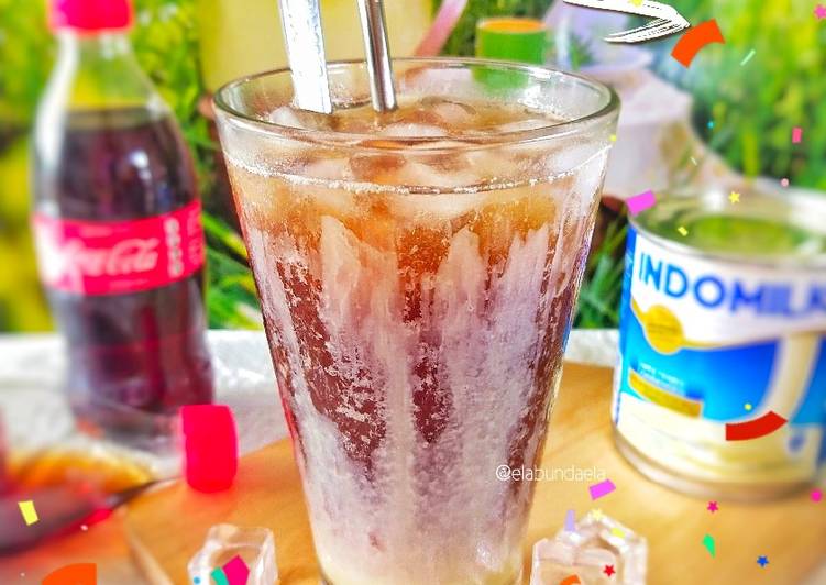 Bagaimana Menyiapkan Es Cola Susu yang Sempurna