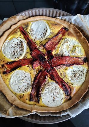 Une photo de Tarte aux poivrons, lardons et chèvre frais