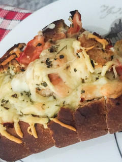 Una foto de Pan con queso fundido