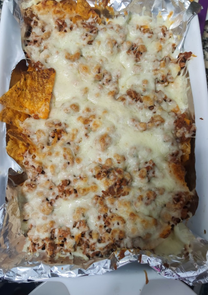 Una foto de Nachos de jijas y queso