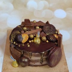 A picture of Overloaded Chocolate Cake 🤎.