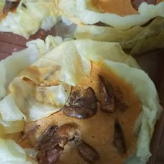 Cabbage wrap moi moi A picture of Cabbage wrap moi moi.