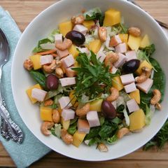 A picture of Spring Salad with Mango, Chicken, Spinach & Cashews.