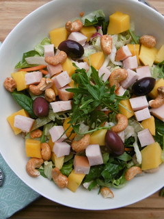 A picture of Spring Salad with Mango, Chicken, Spinach & Cashews.
