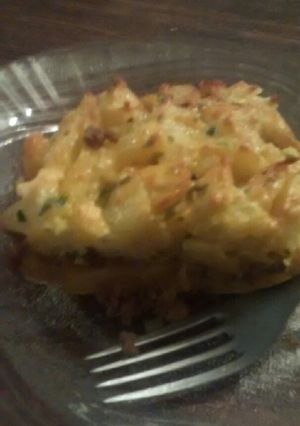 Una foto de Tortilla de papa rellena con carne