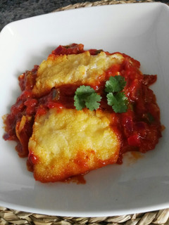 Una foto de Bacalao con tomate