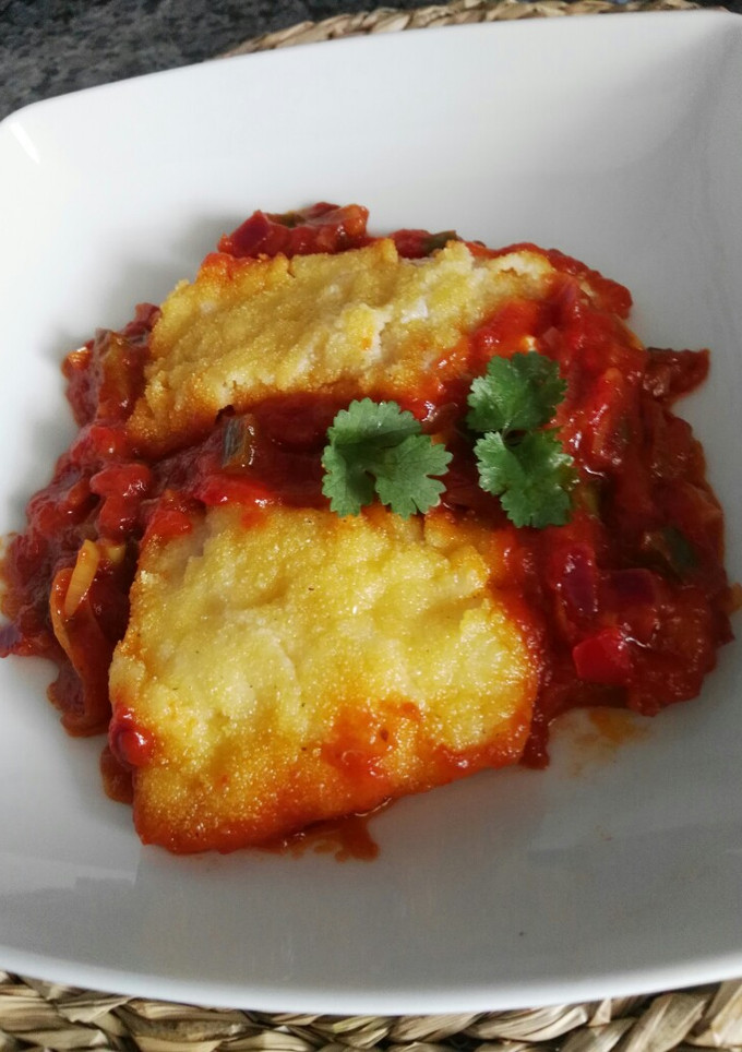 Una foto de Bacalao con tomate