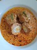 Quail eggs-stuffed chicken meatballs with creamy sauce