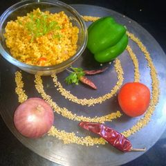 A picture of Veggie daliya upma.