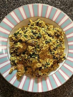 A picture of Egusi soup with achi.