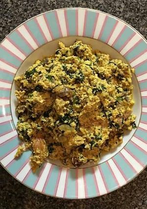 A picture of Egusi soup with achi.