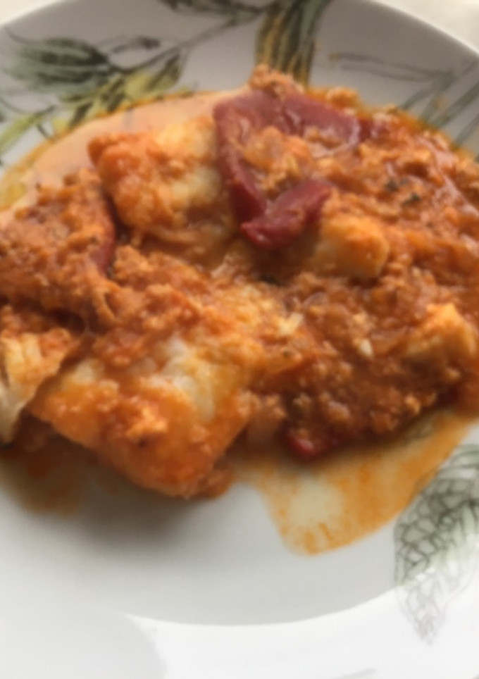 Una foto de Bacalao con tomate