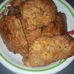A picture of Fried gurasa an egg.