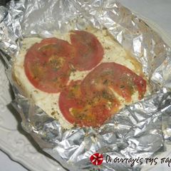 Feta in aluminum foil A picture of Feta in aluminum foil.
