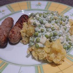 A picture of Healthy Sausages with Crushed Potatoes and Creamy Peas.