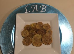 Una foto de Fritura Horneada de Calabacín Amarilla al Parmesano
