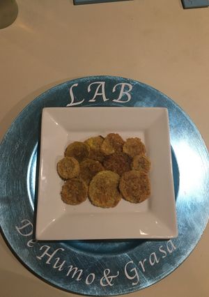 Una foto de Fritura Horneada de Calabacín Amarilla al Parmesano