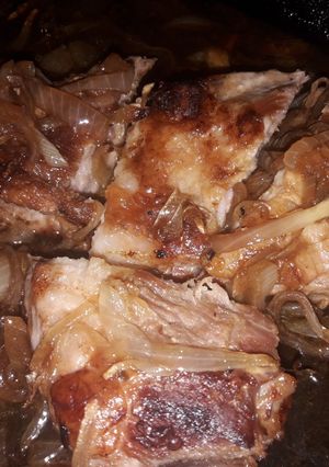 Una foto de Cerdo con cebollitas salteadas