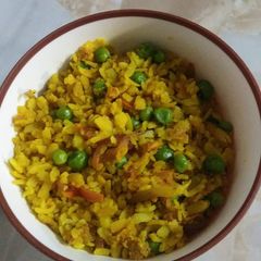 A picture of Poha with mix vegetable.