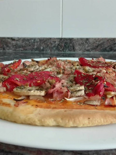 Una foto de Pizza