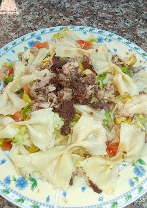 Une photo de Farfalles aux reste des aliments