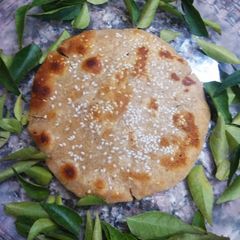 A picture of Til jawar parantha.
