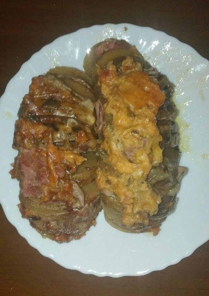 Una foto de Patatas asadas rellenas de beicon y queso en la olla GM g
