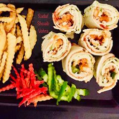 A picture of PIN ROLL SANDWICHES or COLOURFUL SANDWICHES.