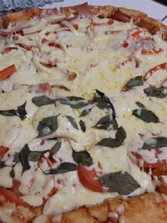 Una foto de Pizza mixta 🍕🍕🍕