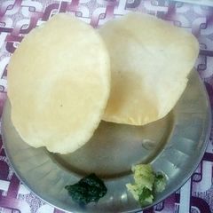 A picture of चावल को पूडी.