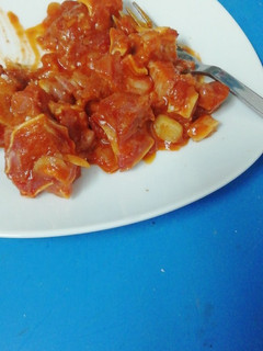 Una foto de Oreja con tomate