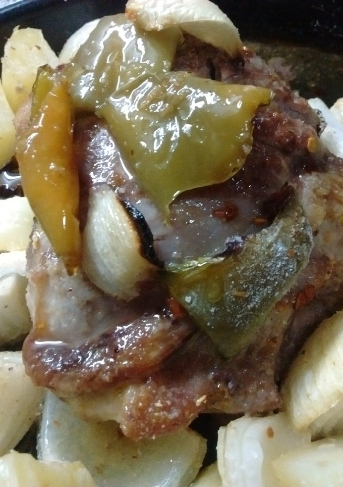 Una foto de Tortuguita de cerdo al horno con vegetales