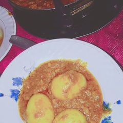 A picture of Egg and potato curry.