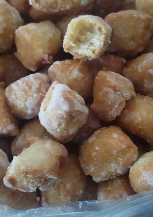 A picture of Visheti /sweet coated fried tiny/ African donuts.