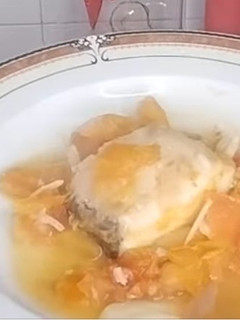 Una foto de Bacalao con tomate