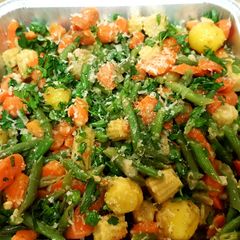 A picture of Garlic butter sautéed vegetables with parmesan cheese.