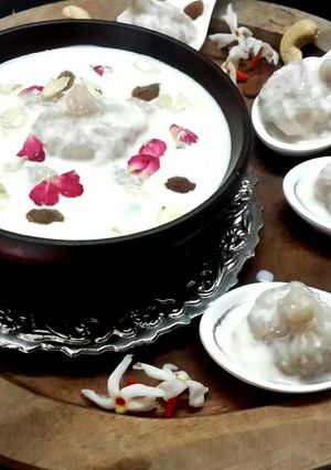 A picture of Steamed Coconut Dumplings in Kheer.